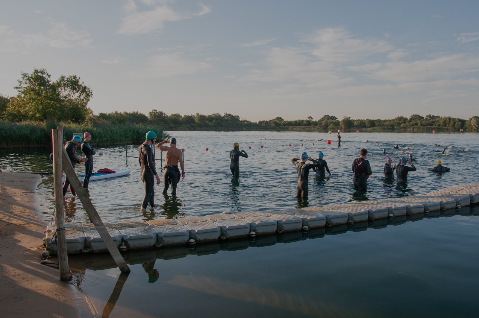 Swimmers entering the lake